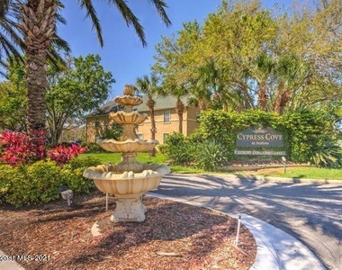 7667 N Wickham Road - Photo Thumbnail 1