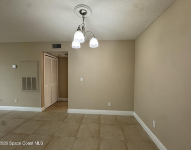7667 N Wickham Road - Photo Thumbnail 9