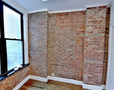 E 13th St. - Photo Thumbnail 1