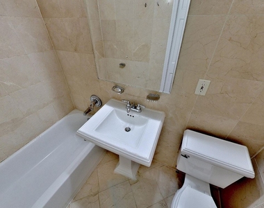 E 13th St. - Photo Thumbnail 4