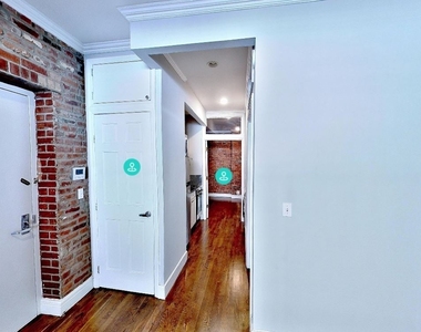 E 13th St. - Photo Thumbnail 2