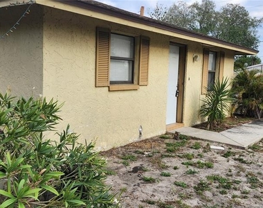 5509 Riddle Road - Photo Thumbnail 2