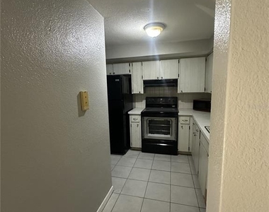 5509 Riddle Road - Photo Thumbnail 5