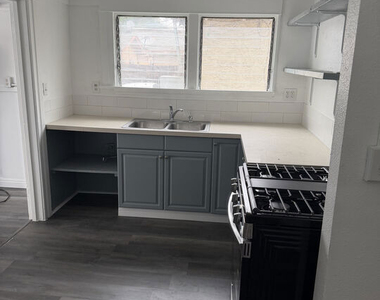 3925 S Normandie Avenue - Photo Thumbnail 1