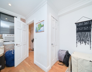 410 E 64th Street - Photo Thumbnail 9