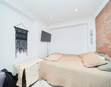 410 E 64th Street - Photo Thumbnail 6
