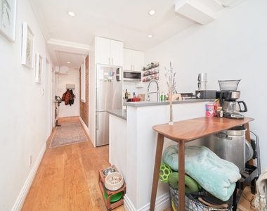 410 E 64th Street - Photo Thumbnail 2