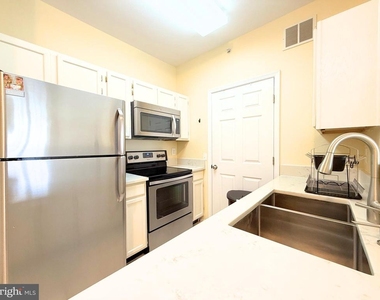 1580 Spring Gate Drive - Photo Thumbnail 4