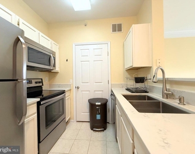 1580 Spring Gate Drive - Photo Thumbnail 3