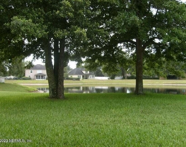 1603 Canopy Oaks Drive - Photo Thumbnail 6