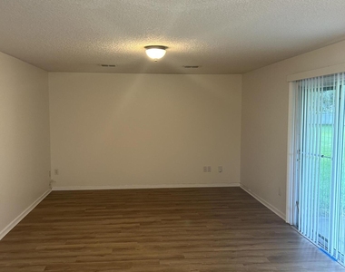 1603 Canopy Oaks Drive - Photo Thumbnail 2