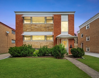 8819 N Wisner Street - Photo Thumbnail 1