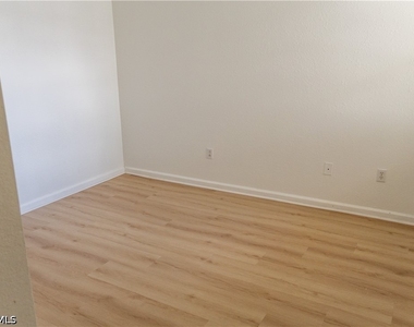 7029 Ambrosia Lane - Photo Thumbnail 7