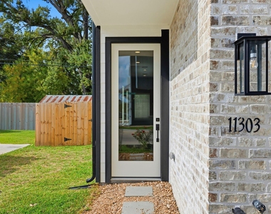 11303 Stonework Grove Lane - Photo Thumbnail 2