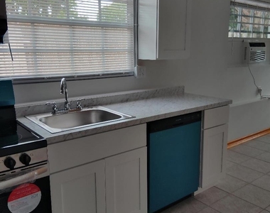 11610 Ellison Wilson Road - Photo Thumbnail 1