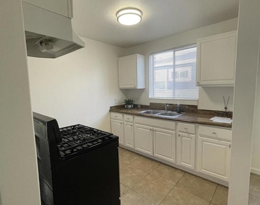 331 E 5th Street - Photo Thumbnail 3