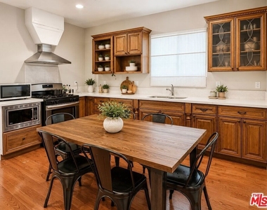 1212 W 37th Drive - Photo Thumbnail 1