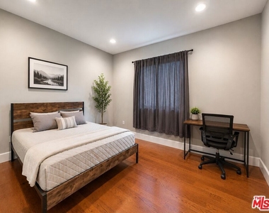 1212 W 37th Drive - Photo Thumbnail 2