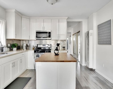 1138 W 52nd Street - Photo Thumbnail 4