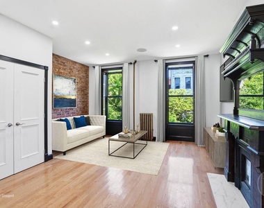 114 W 131st Street - Photo Thumbnail 2