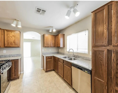 12563 W Charter Oak Road - Photo Thumbnail 11