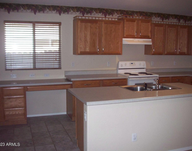 10945 W Loma Lane - Photo Thumbnail 3