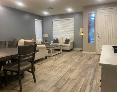 9237 W Irma Lane - Photo Thumbnail 2