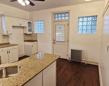 7826 S Bennett Avenue - Photo Thumbnail 18