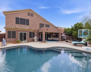 9750 E Gelding Drive - Photo Thumbnail 1