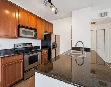 7009 E Acoma Drive - Photo Thumbnail 4