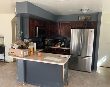 1807 E 36th Avenue - Photo Thumbnail 5