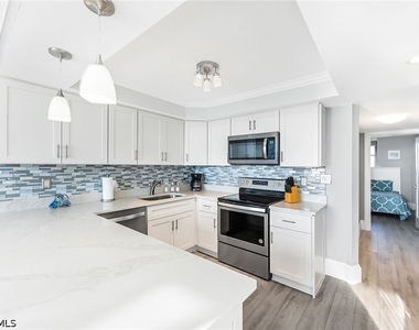9375 Gulf Shore Drive - Photo Thumbnail 9