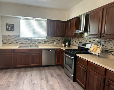 1111 E Turney Avenue - Photo Thumbnail 2