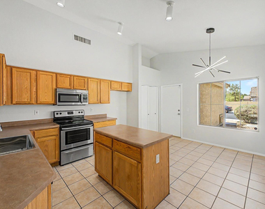 7043 W Phelps Road - Photo Thumbnail 9