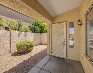 7043 W Phelps Road - Photo Thumbnail 3