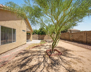 7043 W Phelps Road - Photo Thumbnail 31