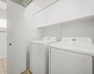 7043 W Phelps Road - Photo Thumbnail 25