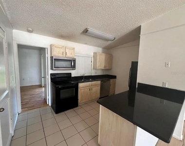 1109 Woodman Way - Photo Thumbnail 1