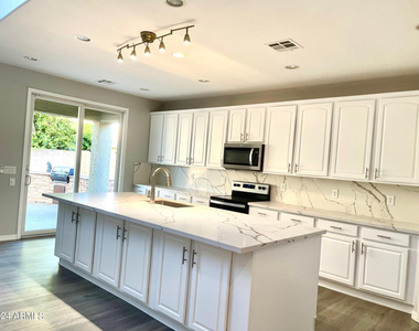 2116 E Chanute Pass - Photo Thumbnail 2