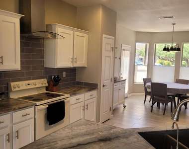 16248 W Tuscany Way - Photo Thumbnail 3