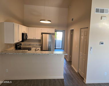 5704 E Aire Libre Avenue - Photo Thumbnail 6
