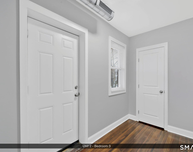 144 Madison Street - Photo Thumbnail 6