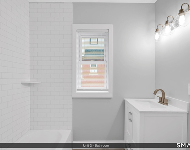 144 Madison Street - Photo Thumbnail 4