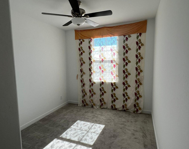 13316 W Red Range Way - Photo Thumbnail 4