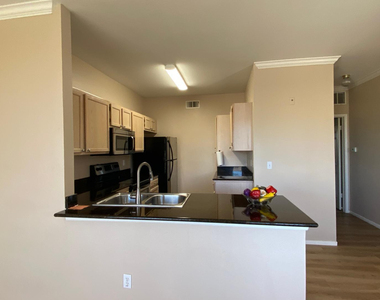 7009 E Acoma Drive - Photo Thumbnail 3