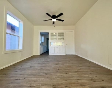 938 E 12th Street - Photo Thumbnail 4