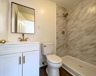 938 E 12th Street - Photo Thumbnail 1