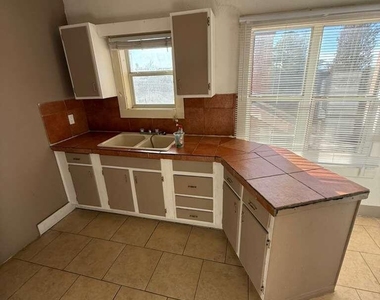 1165 E 10th Street - Photo Thumbnail 5