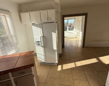 1165 E 10th Street - Photo Thumbnail 1
