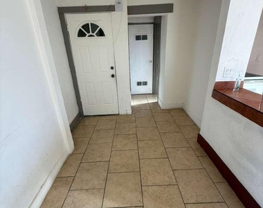 1165 E 10th Street - Photo Thumbnail 3